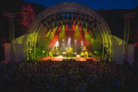 Cheering crowd at Live Klostersommer Festival in Historic Monastery