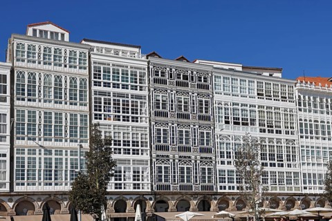 Decorative house facades on the harbour promenade in the historic city centre of La Coruna