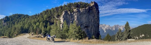 Motorbike BMW R1200 GS Adventure on a steep rock near Forte Pramand