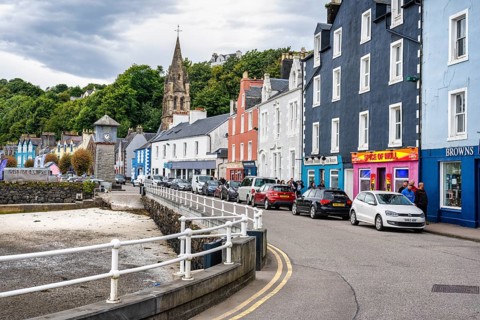 Main Street with colourful row of shops in the harbour town of Tobermory