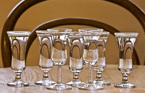 Glasses on table filled with Dutch gin