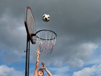 Basketball Jump with the ball to the basket and net