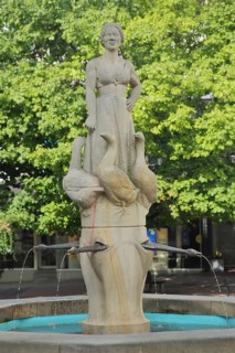 Goose fountain with sculpture woman with goose figures