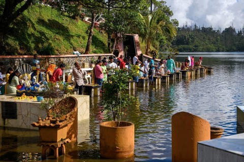 Devout Hindus make sacrifices to Hindu deities Religious site largest Hindu sanctuary Sanctuary for religion Hinduism outside India for devout Hindu Hindus Saint lake Crater lake Grand Bassin Ganga Ta...