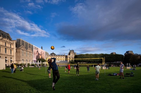 Young people playing volleyball