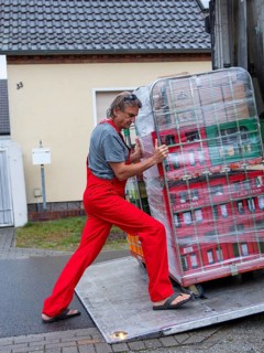 Man at loading ramp truck