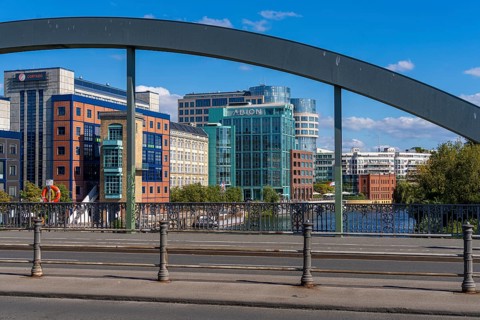 Bridge arch of the Lessingrbuecke with the office complexes at the Spreebogen
