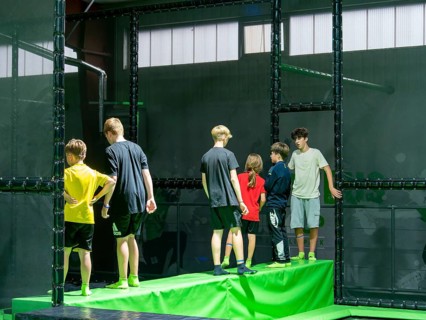 Children in trampoline arena