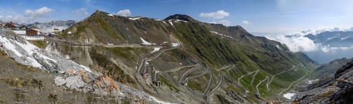 Panoramic view from Tibethaus on north ramp Ascent from pass road to mountain pass Alpine pass with serpentines Narrow bends hairpin bends Stelvio Pass Stelvio