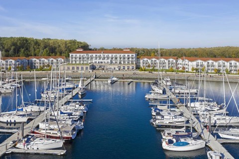 Weisse Wiek holiday resort at Boltenhagen along the Baltic Sea showing hotels and sailing boats in marina
