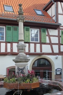 Hundlesbrunnen with sculpture Brettener Hundle