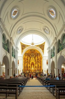 Interior of the church and the virgin in the sanctuary of El Rocio. Huelva. Andalusia