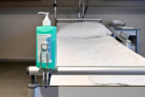 Hand disinfectant hospital bed