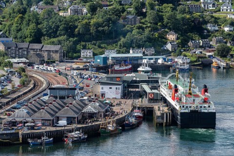 View over the ferry harbour of the town of Oban with the ferry Isle of Lewis operating between Oban and Isle of Barra