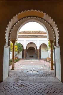 Detail of the patio doors with water fountains inside the Alcazaba in the city of Malaga