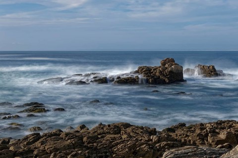 Surf on the rocky coast off Penmarch on the Atlantic Ocean. Brittany