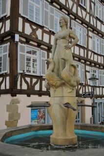 Goose fountain with sculpture woman with goose figures