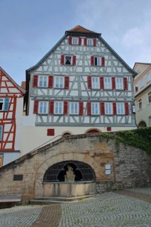 Market square with half-timbered house and market fountain
