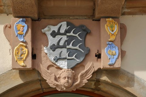 City coat of arms and angel on the historic town hall
