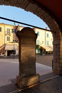 Memorial stone to the translator Domizio Calderini