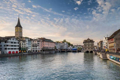 Old Town of Zurich with St. Peter's Church and Town Hall on the Limmat