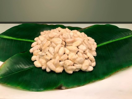 Cocoa beans decorated on a leaf