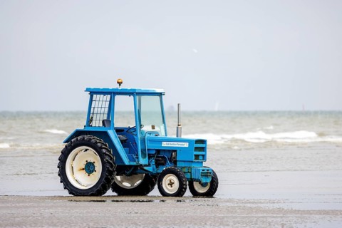 Tractor for transporting small sailboats on the beach