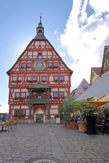 Historic town hall on the market square with street pub