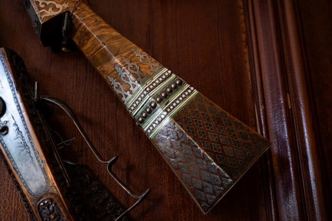 Inlaid gun
