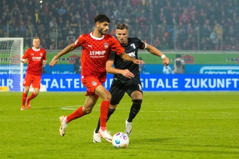 Ermedin DEMIROVIC FC Augsburg left in duel with Eren DINKCI 1.FC Heidenheim