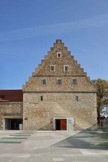 Historic Renaissance Ebracher Hof and modern glass wall