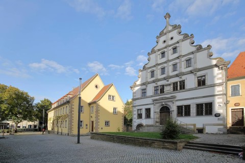 Historic Renaissance Old Grammar School built 1582 with tail gable and Protestant deanery building