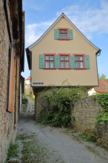 Narrow half-timbered house on the historic town wall