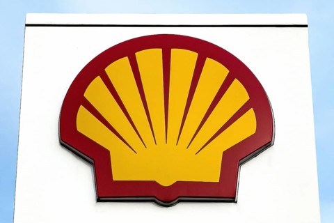 Logo in the shape of stylised scallop shell of oil company oil multinational petrol station operator for petrol diesel Shell at petrol station