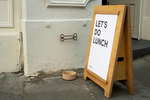 Entrance to restaurant with water bowl for dogs