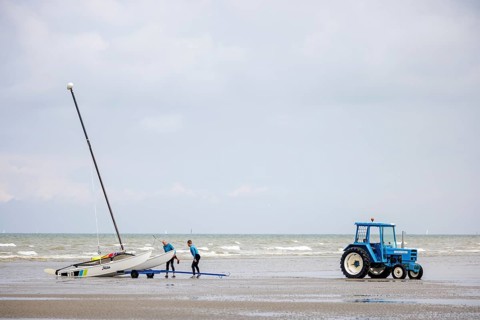 Tractor for transporting small sailboats on the beach