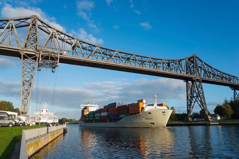Suspended ferry and ship under the Rendsburg railway high bridge