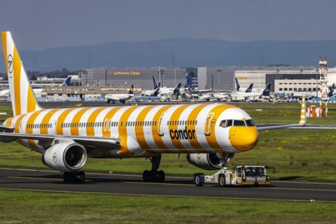 A Condor aircraft being towed