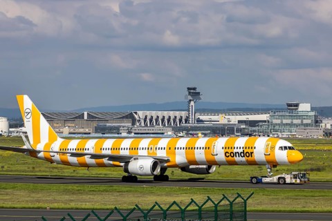 A Condor aircraft being towed