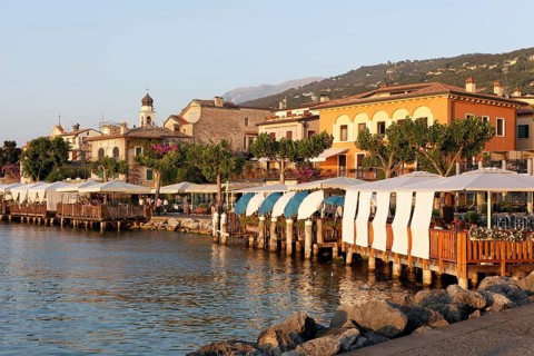 Restaurant terraces with sunshades on the lakeshore