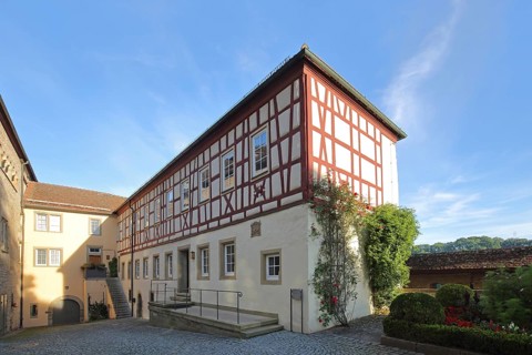 Half-timbered house in the courtyard of the Romanesque Comburg Monastery