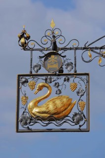 Golden nose sign of the restaurant swan