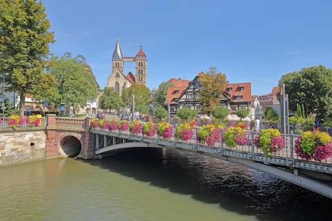 Agnes Bridge over the Rems with Gothic Town Church St. Dionys River
