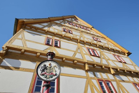 Historical house of the town history with coat of arms