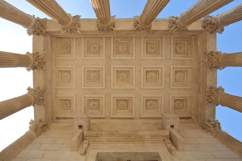 Ceiling and columns with decorations from the ancient Roman UNESCO podium temple Maison Carree
