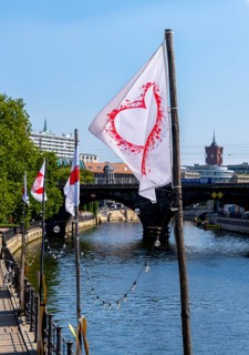 White flag with red heart
