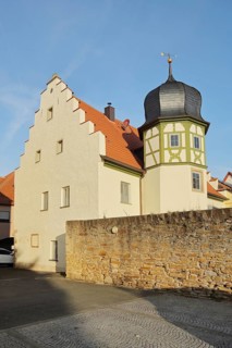 Historic building with stepped gable and onion tower