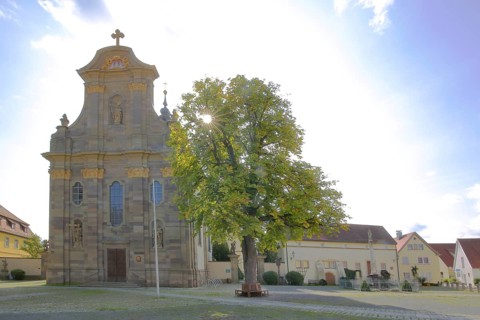 Parish church Kreuzauffindung in the backlight