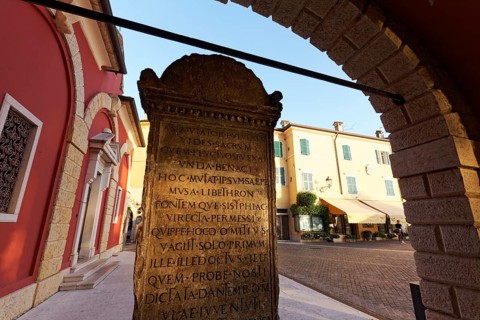 Memorial stone to the translator Domizio Calderini