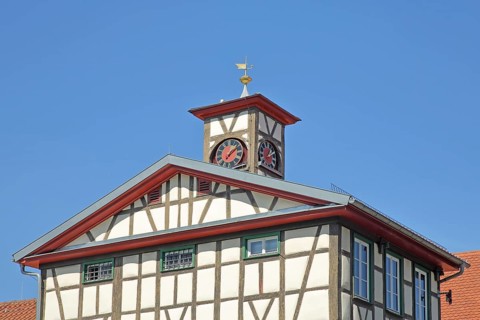 Historic guard house with spire and clock